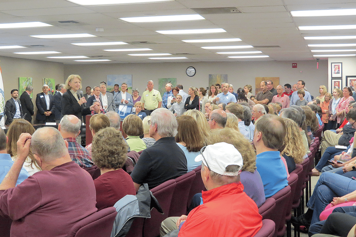 Diana Wheeler addresses the audience in the first City Council chambers, March 2014