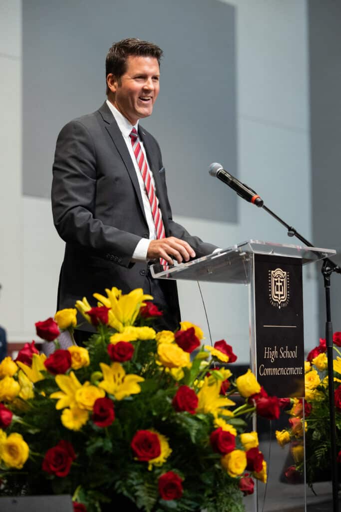 Dr. Scott Harsh delivering the commencement speech