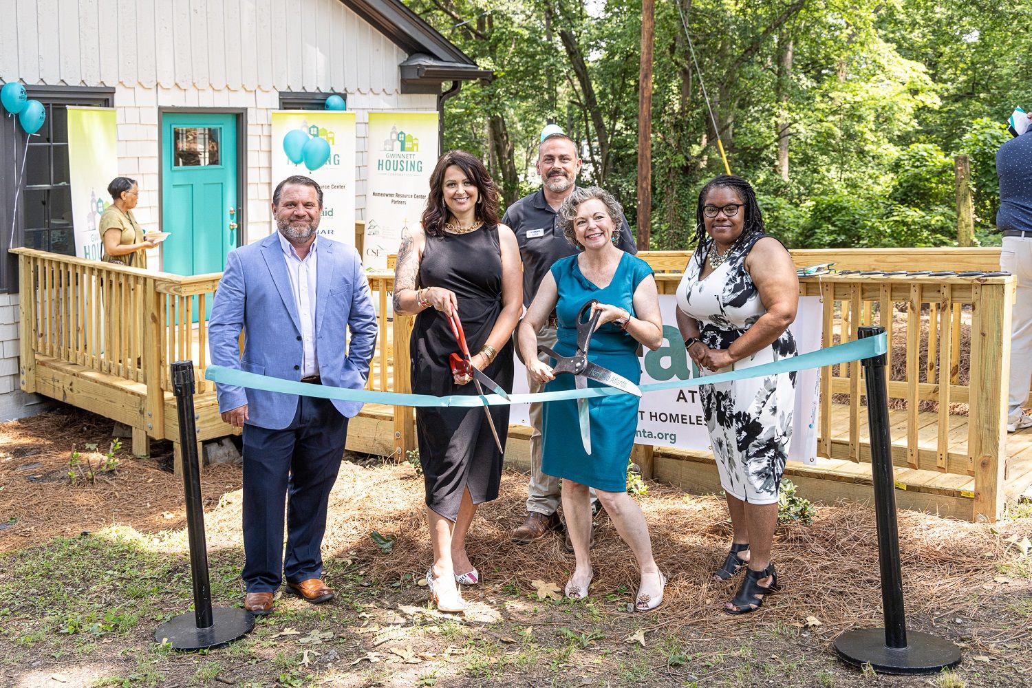 Left to right, Tom Bowers of Lennar, Lelja Prljaca of GHC, Adam Paterson of Lennar, Mandy Crater of Homeaid Atlanta and Karen Ramsey of GHC