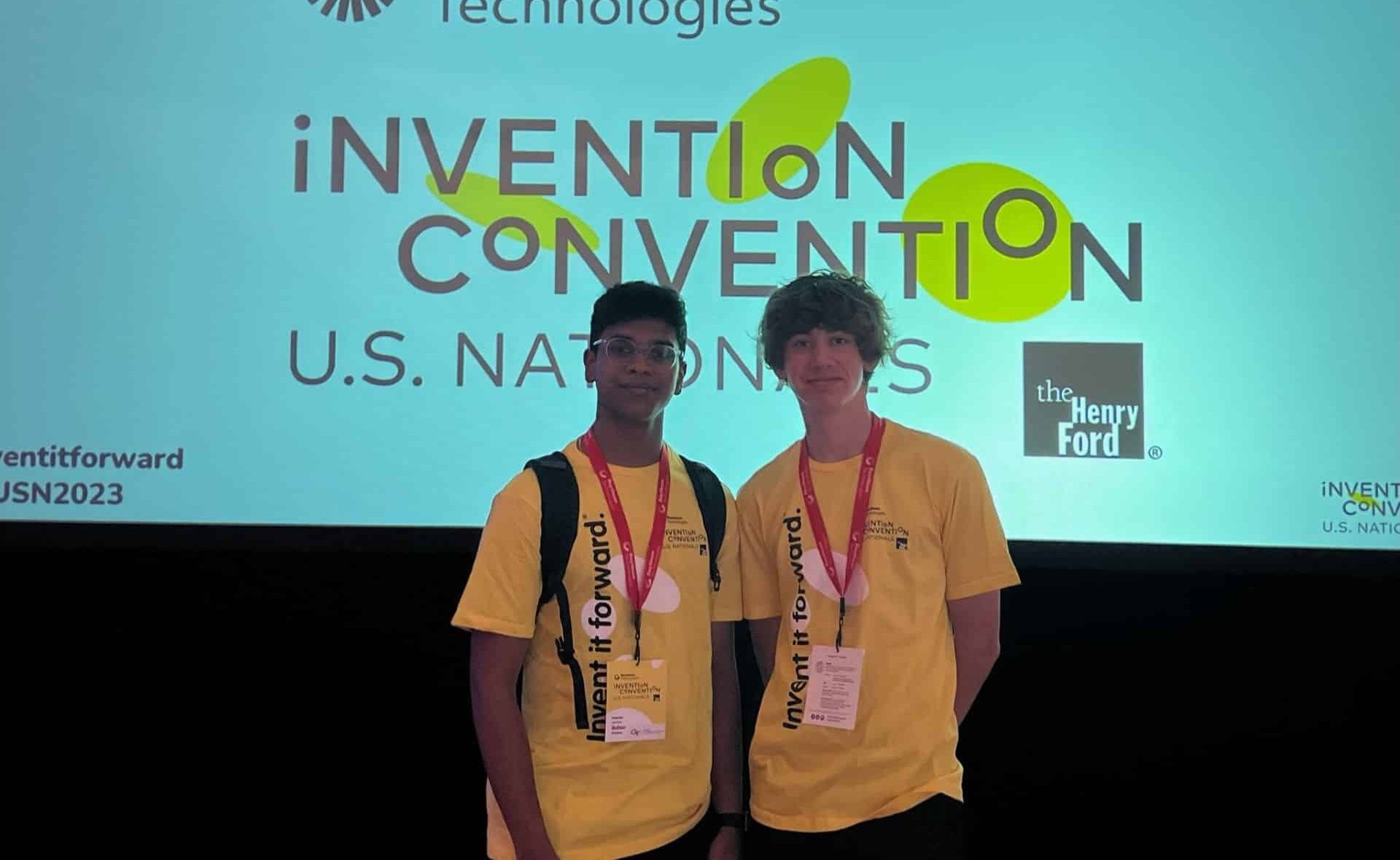 Kumar and Susskind pose in front of the ICW sign at Nationals.