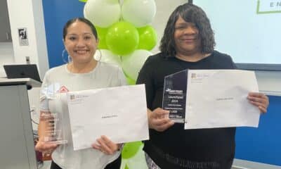 Two women receiving entrepreneurship awards