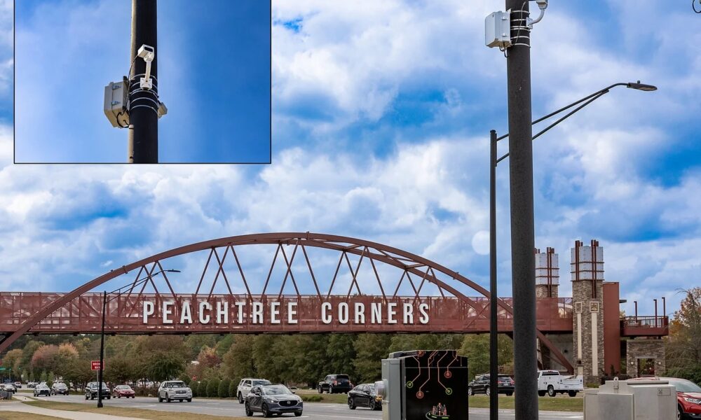 Technology with lights and camera to monitor traffic near the pedestrian bridge in Peachtree Corners