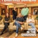 Peachtree Corners Magazine cover featuring a team of attorneys, casually dressed, in the law firm's reception area.