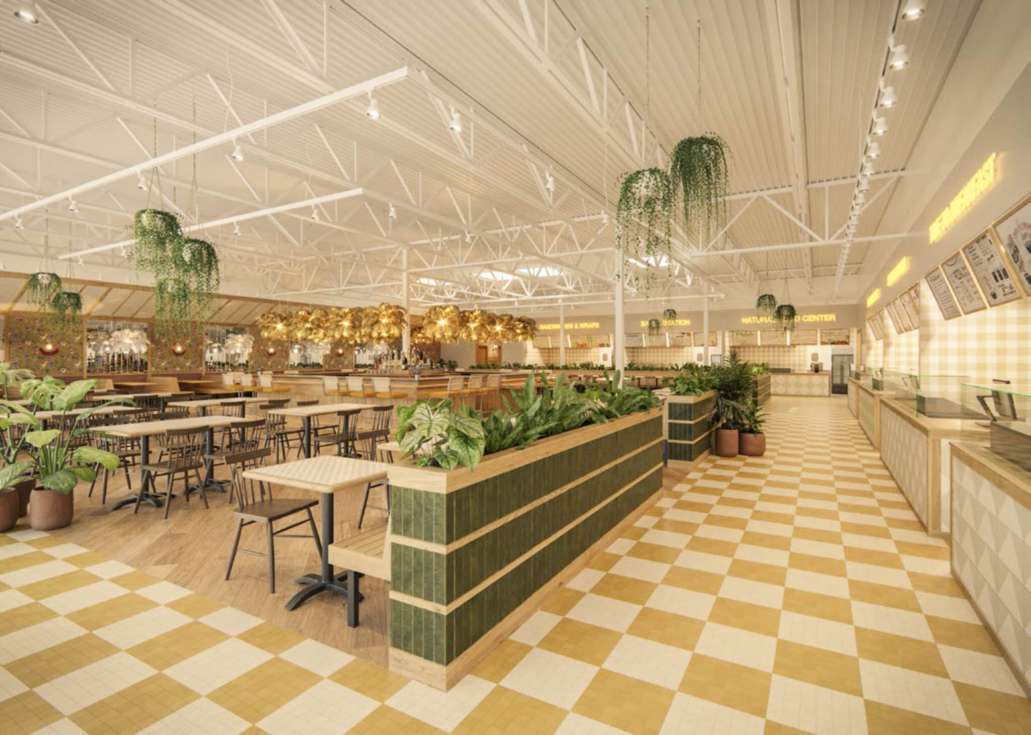 Spacious food hall with gold, white and green accents, high ceilings and checkerboard floor.