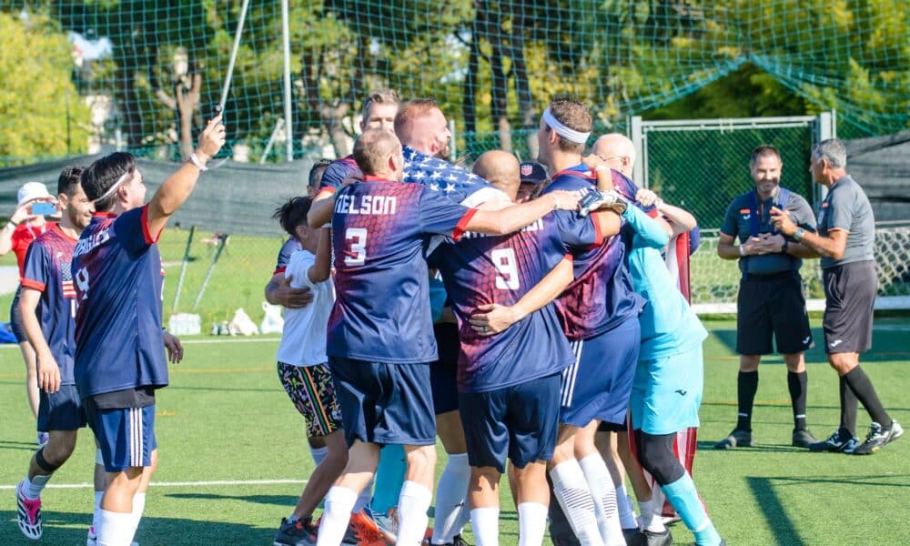 US Soccer team at the Transplant Football World Cup celebrating on the field