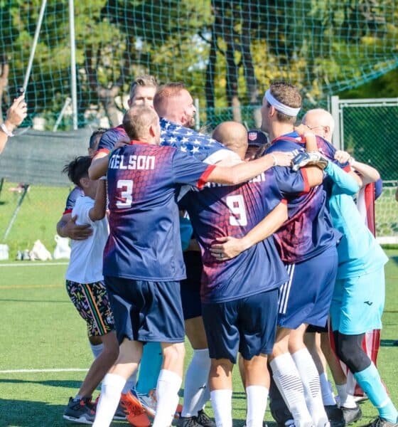 US Soccer team at the Transplant Football World Cup celebrating on the field