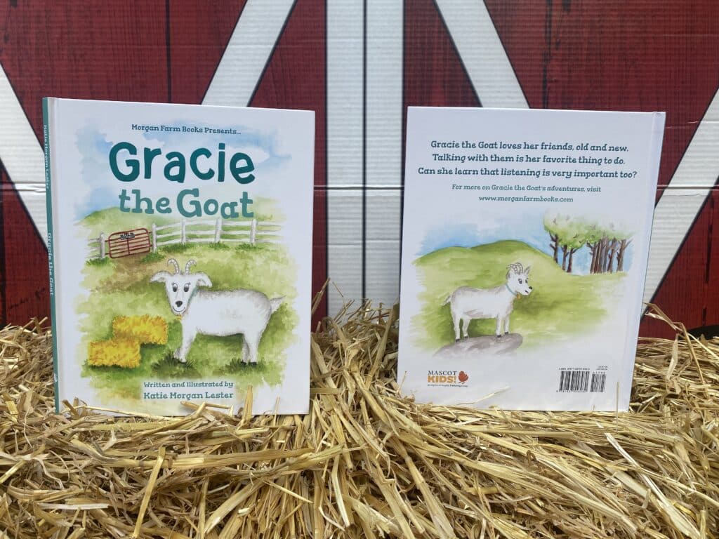 Gracie the Goat children's book by Katie Morgan Lester. Front cover and back cover are shown. The books are sitting on top of a bale of hay in front of a barn.