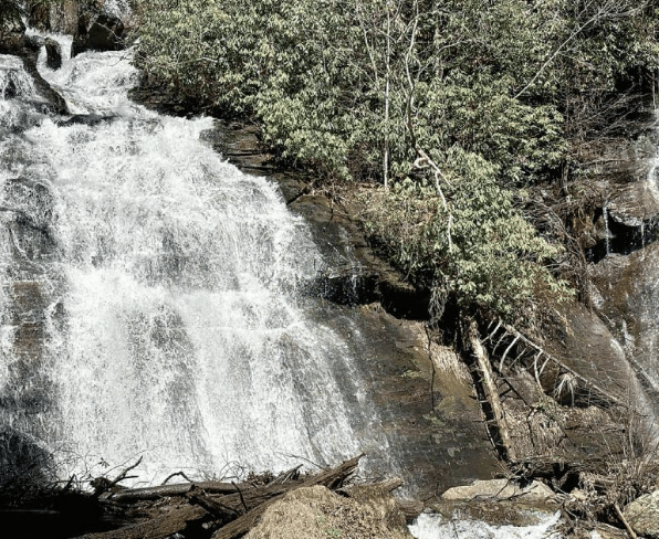 Small waterfall, rocks and greenery in Helen, GA.