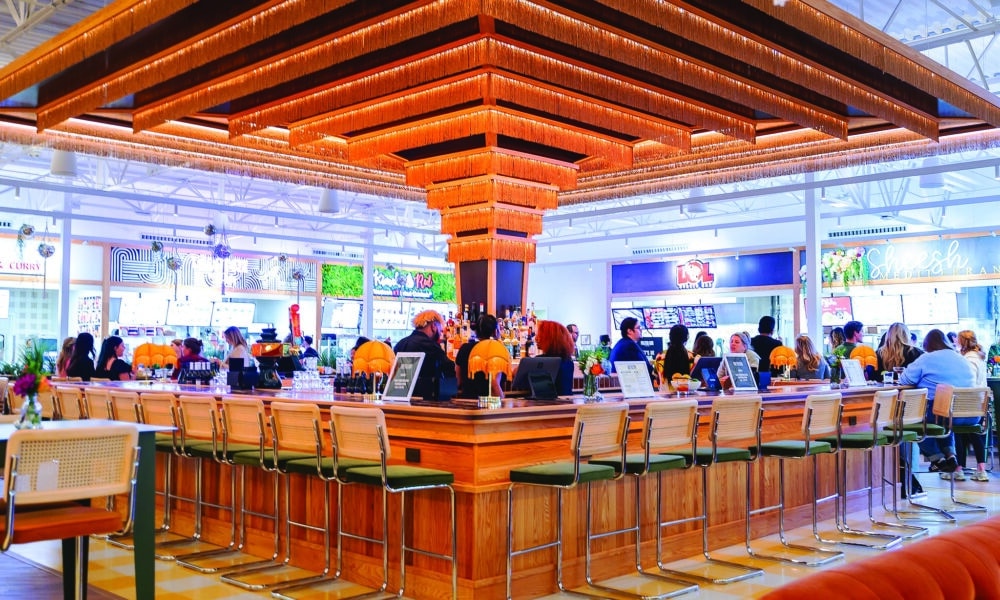 Large bar area in the middle of the high-end Politan Row food hall at The Forum in Peachtree Corners