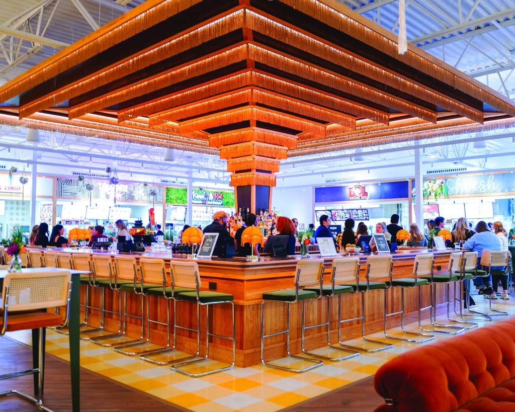 Large bar area in the middle of the high-end Politan Row food hall at The Forum in Peachtree Corners