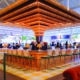 Large bar area in the middle of the high-end Politan Row food hall at The Forum in Peachtree Corners