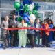 Group of people in front of a Fifth Third Bank location for a ribbon cutting