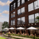 Rendering of a three story building with outdoor cafe tables and umbrellas along the side of it.