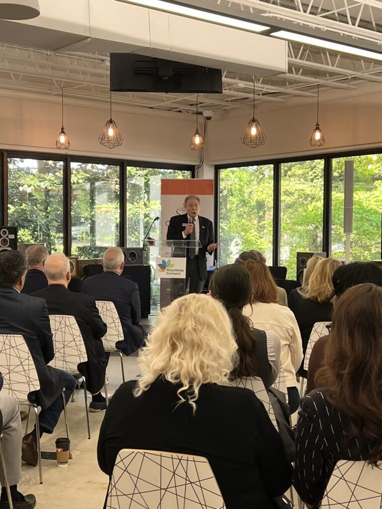 Peachtree Corners Mayor Mike Mason speaking at the opening of the GT Atrium in Peachtree Corners