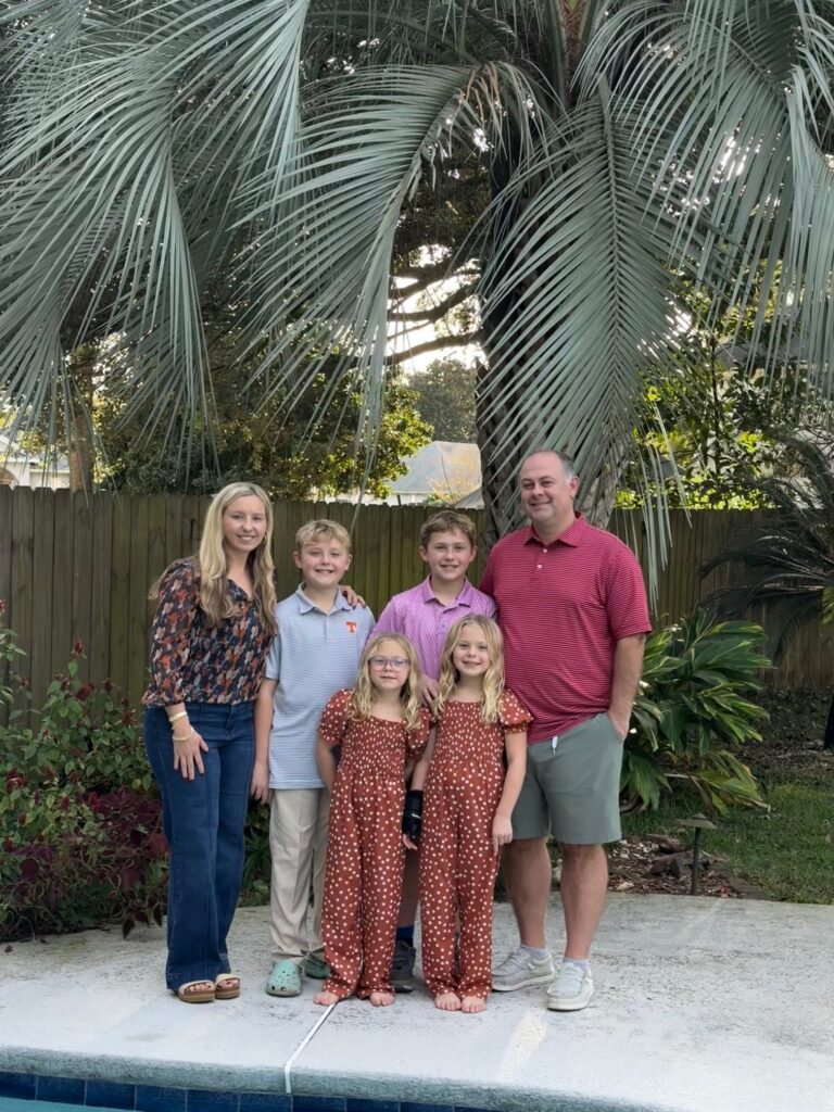 A family with mom, dad and two sets of twins -- pre-teen boys and young girls