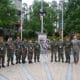 Veterans and city officials in front of a veterans' monument on memorial day 2025